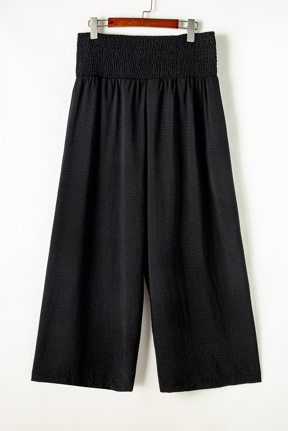 Chic black plus size wide leg pants with shirred high waist