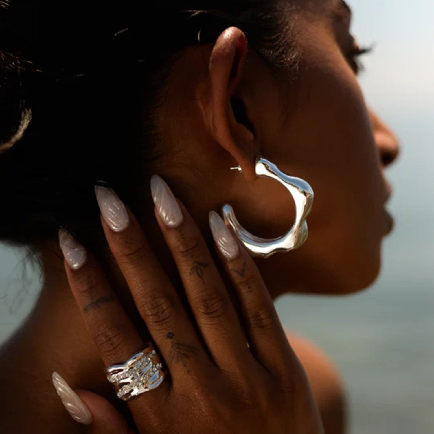 Stainless Steel C-Hoop Earrings.