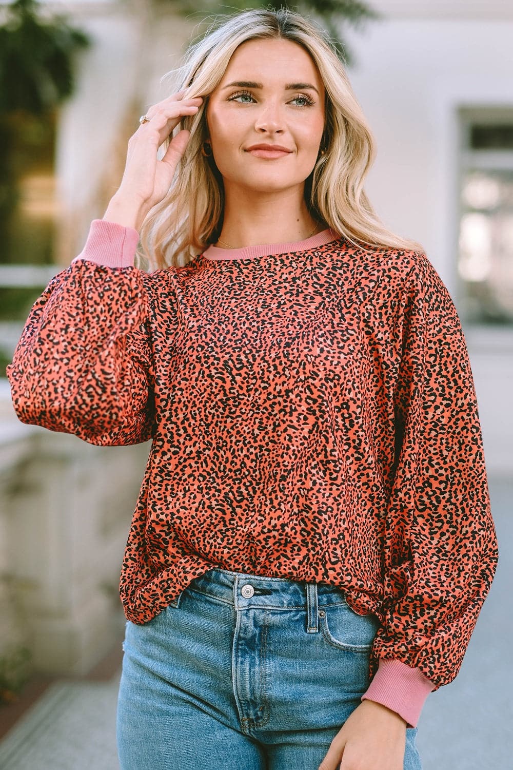 Leopard Round Neck Long Sleeve Sweatshirt.