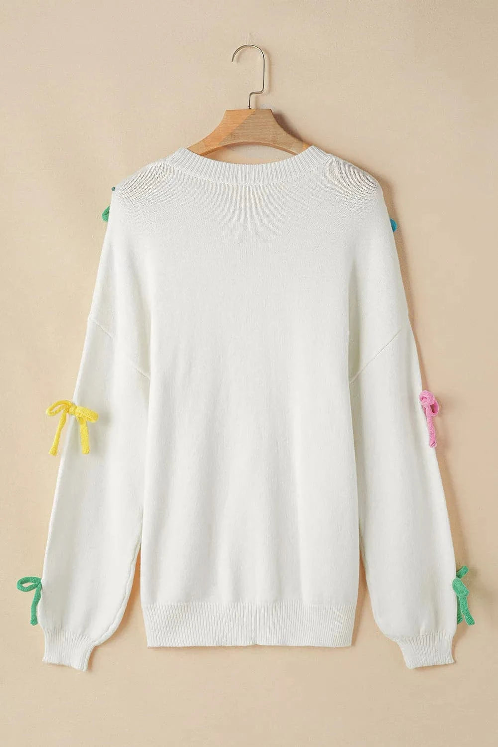 Charming bow accent round neck pullover