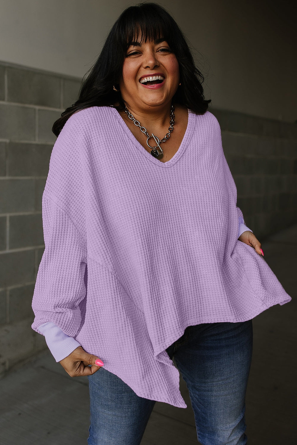 Flattering orchid petal plus size waffle knit top with exposed seams