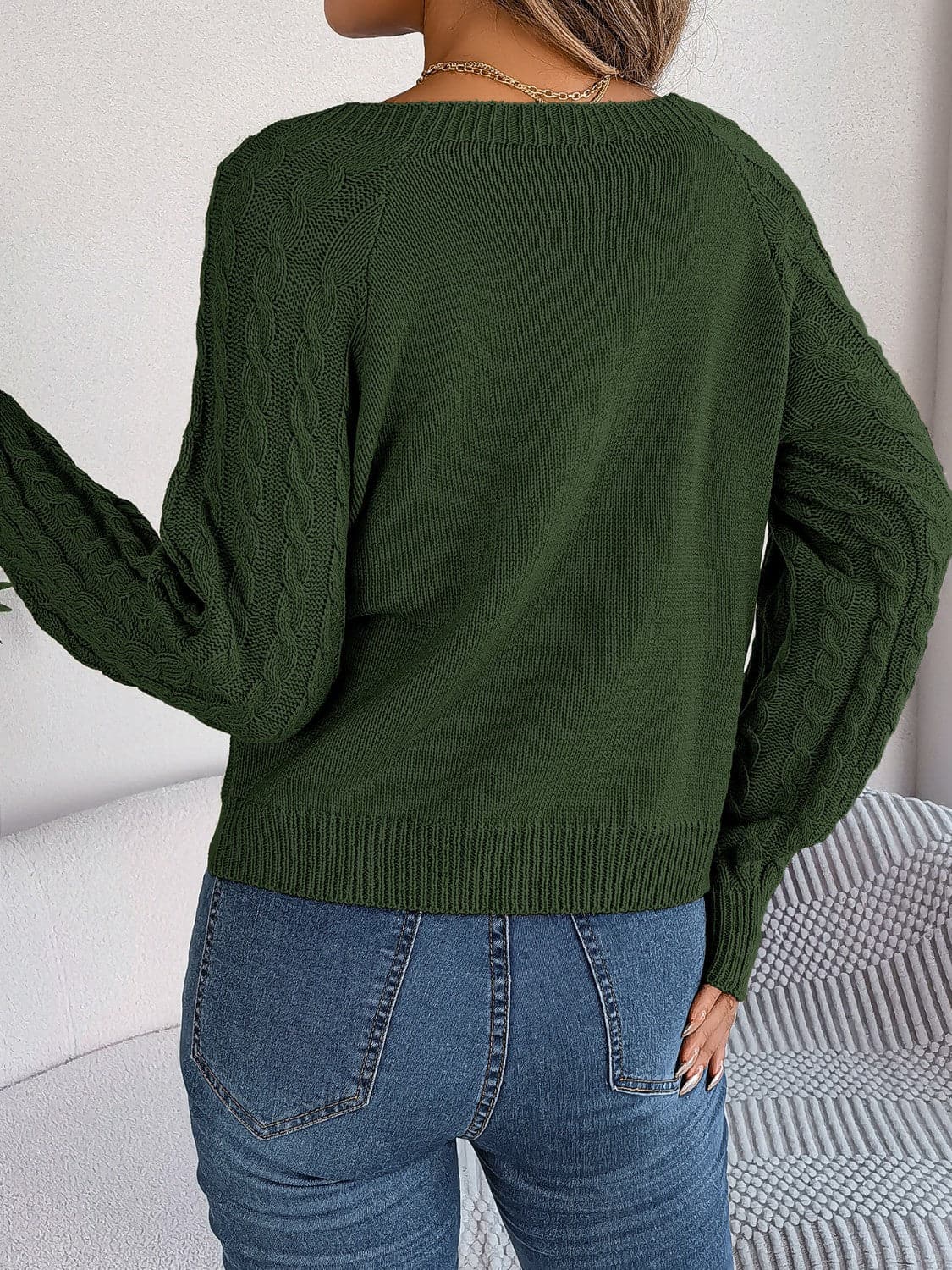 Cable-Knit Round Neck Long Sleeve Sweater.