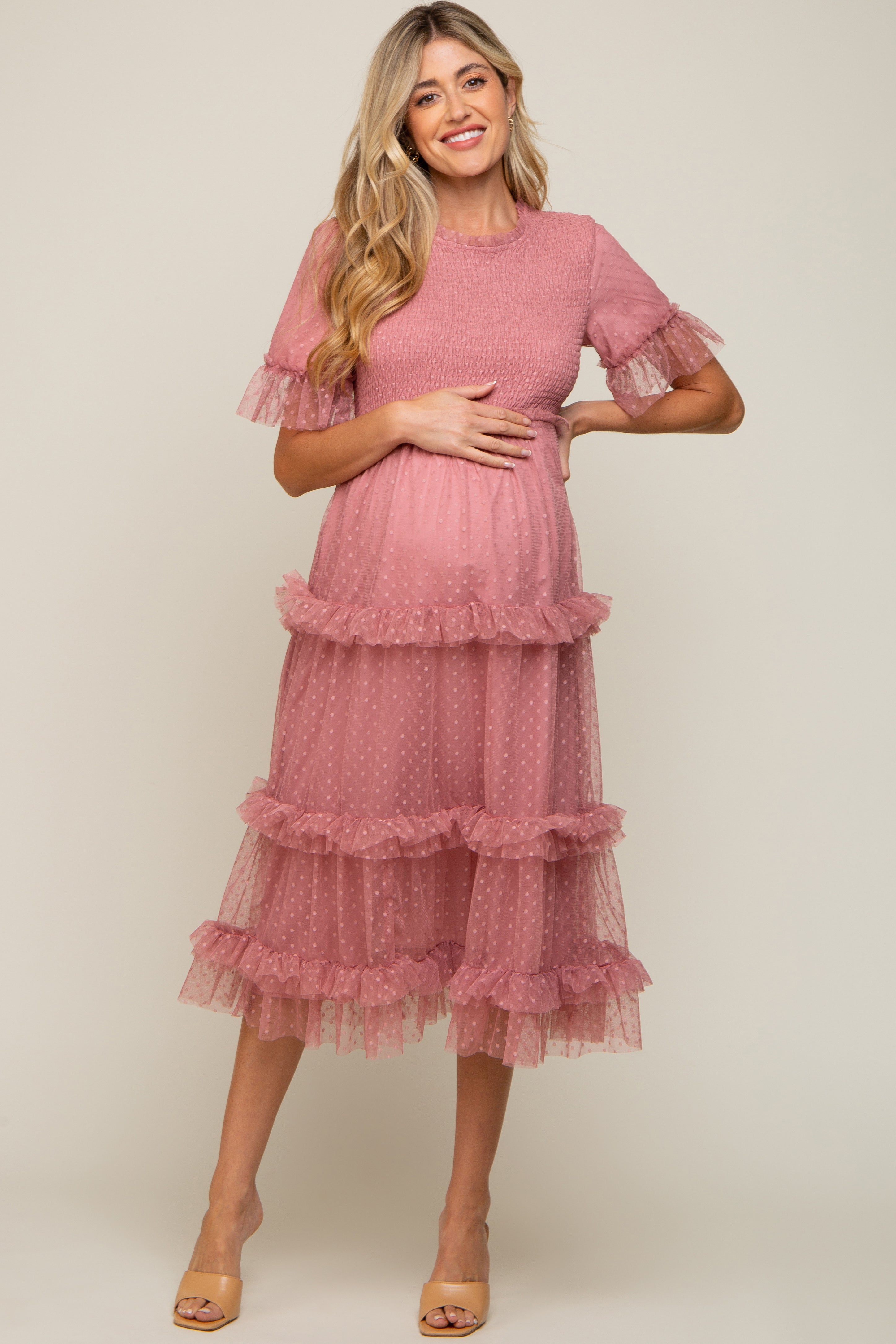 PinkBlush Pink Polka Dot Tulle Smocked Maternity Midi Dress, a charming feminine style for expecting mothers.