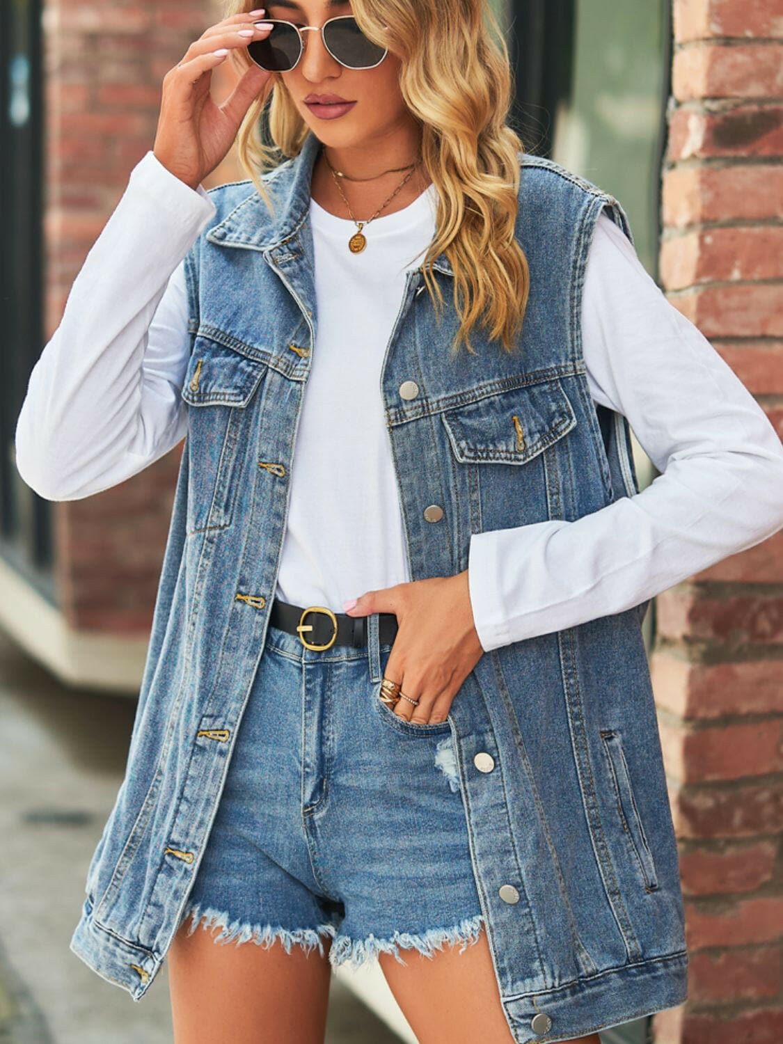 Collared Neck Sleeveless Denim Top with Pockets.