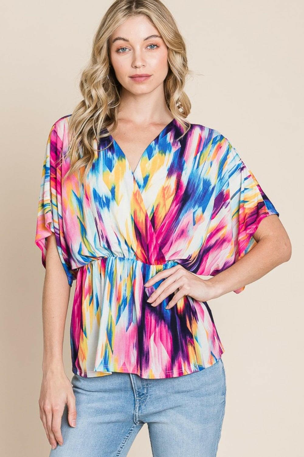 BOMBOM Printed Surplice Peplum Blouse.