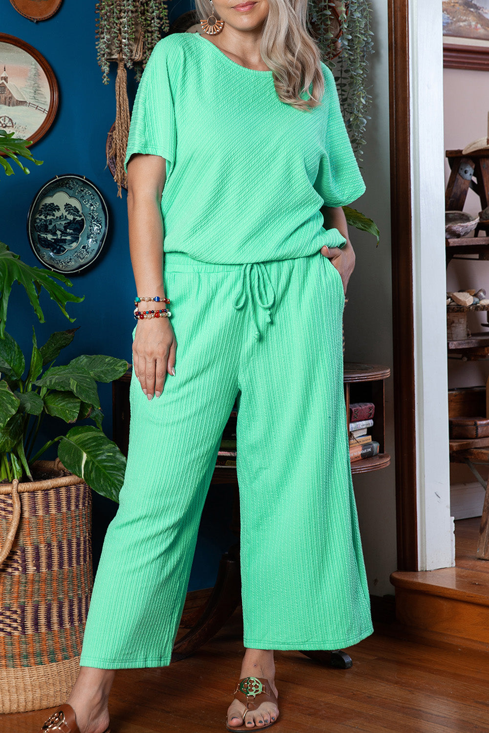 Chic mint green plus size batwing sleeve tee and wide-leg pants ensemble