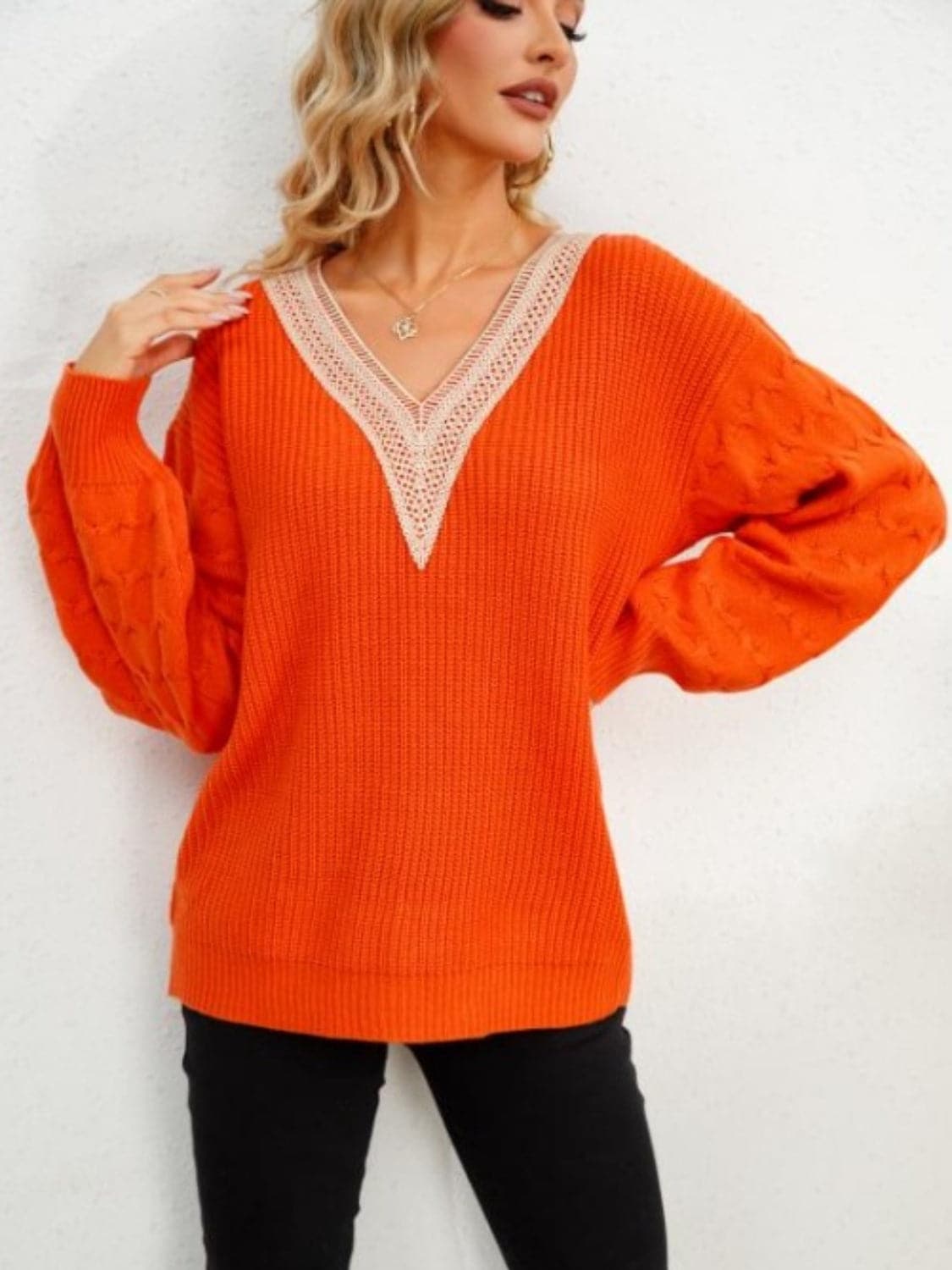 Dropped shoulder v-neck sweater with long sleeves