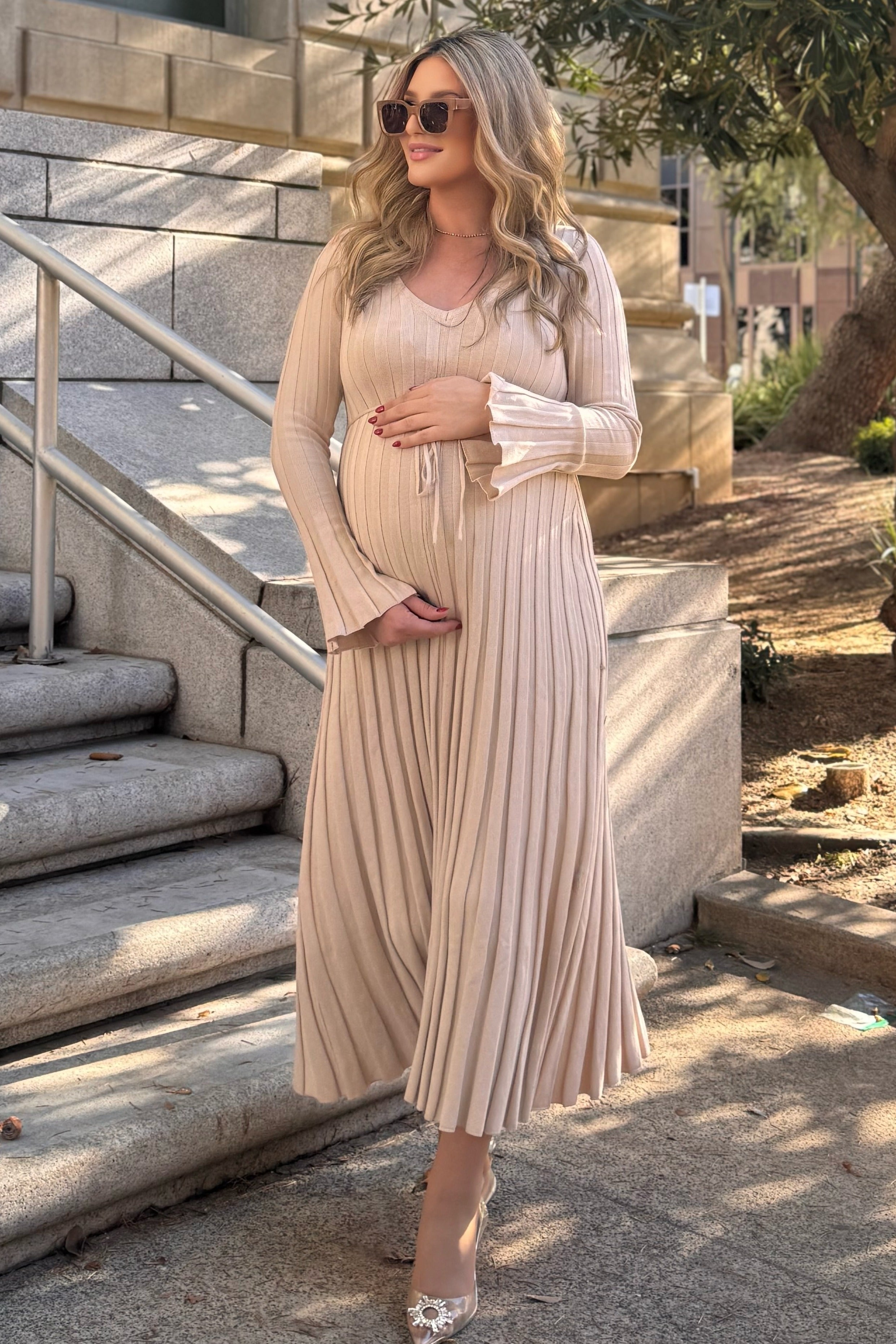 Close-up of the PinkBlush Taupe Ribbed Maternity Knit Maxi Dress, highlighting the delicate ribbed knit material.