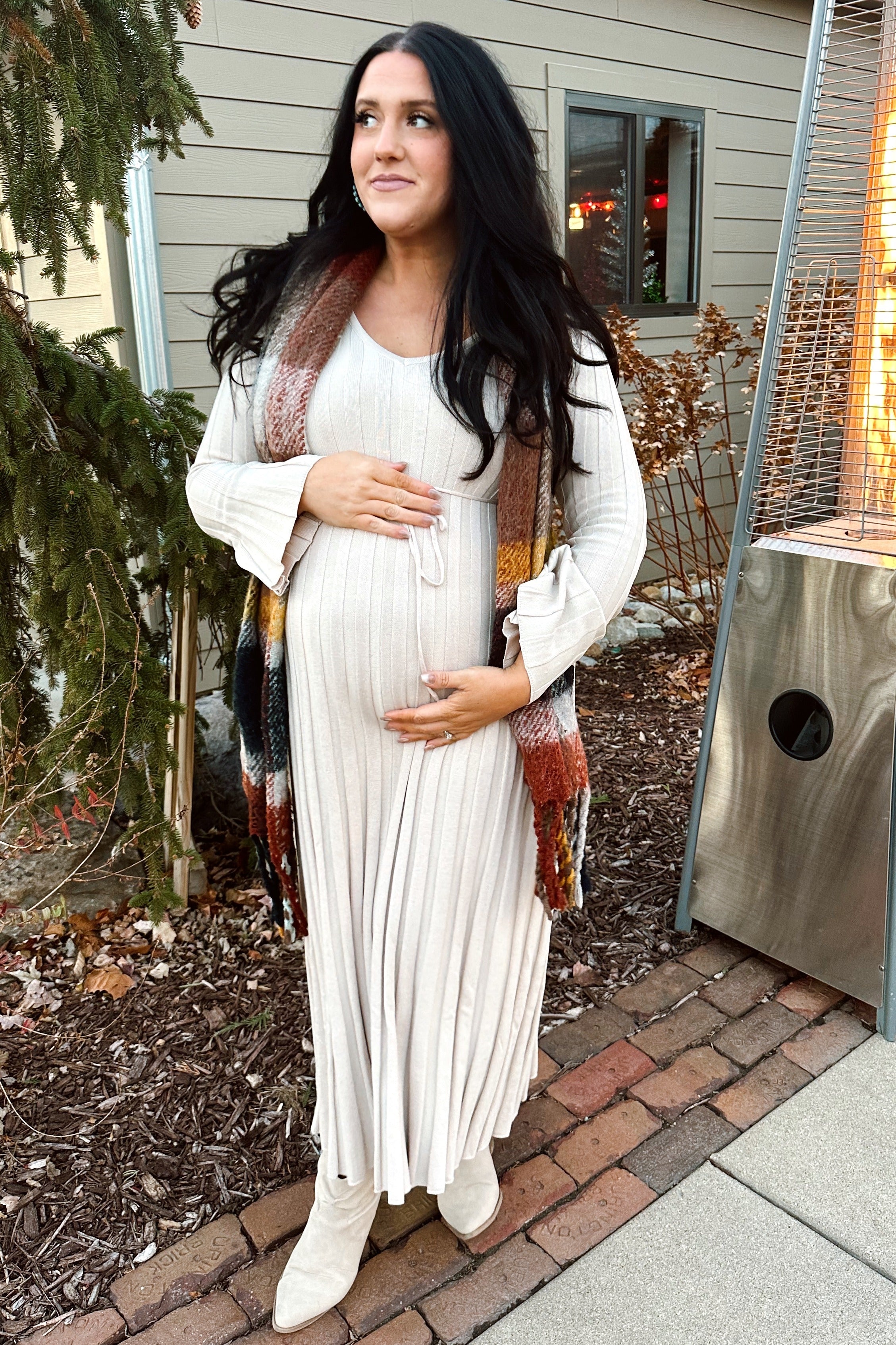 Model wearing the PinkBlush Taupe Ribbed Maternity Knit Maxi Dress, demonstrating its comfortable fit and graceful drape.