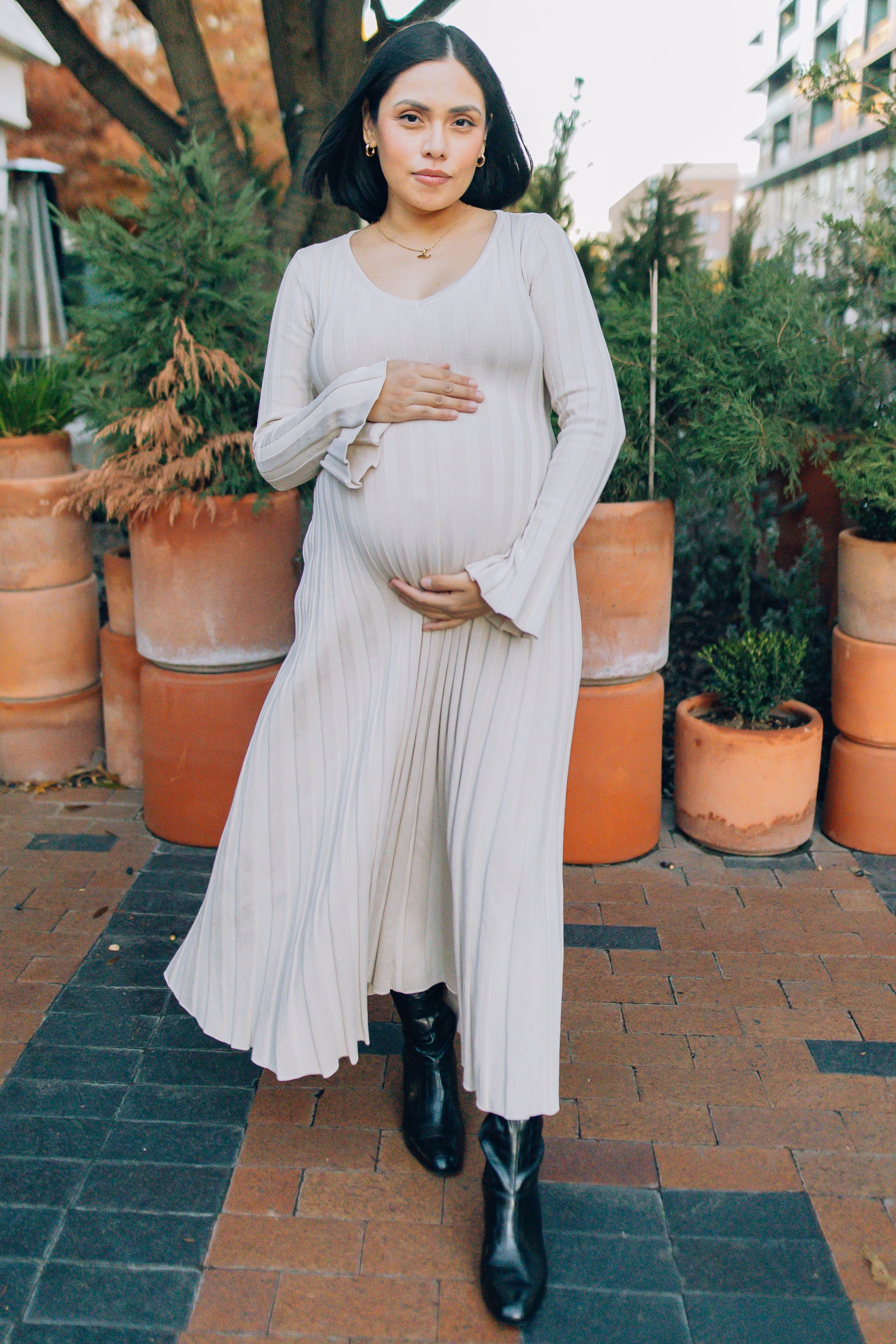 Stylish PinkBlush Taupe Ribbed Maternity Knit Maxi Dress, showcasing its flattering silhouette and soft fabric texture.