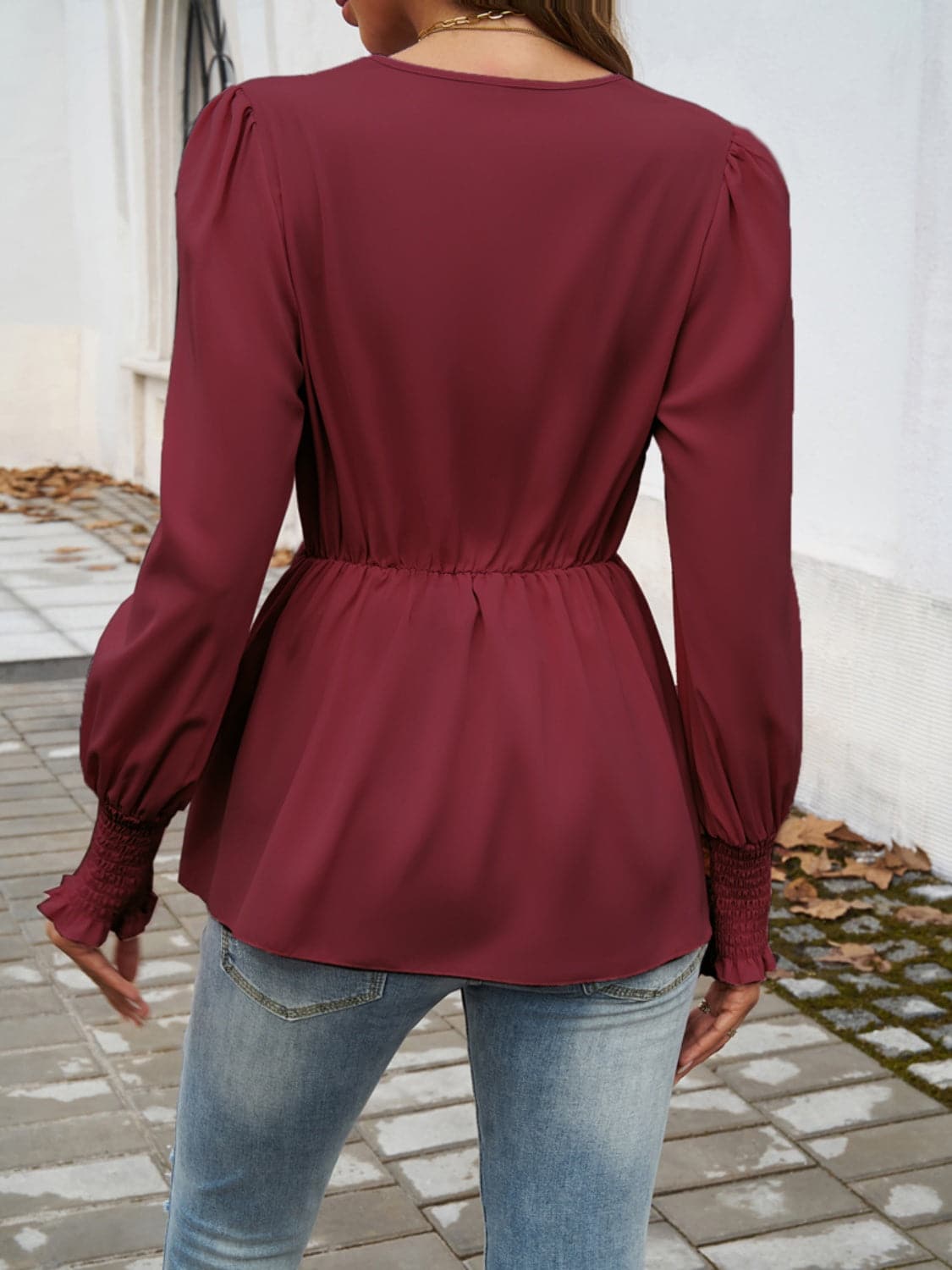 Smocked Surplice Long Sleeve Blouse.