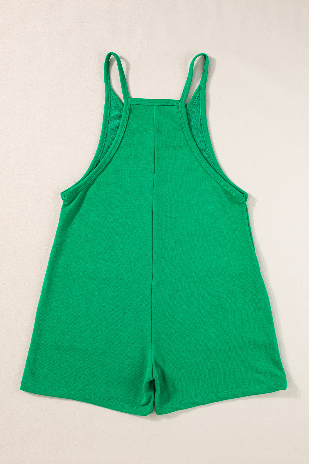 Vibrant green sleeveless v-neck romper with pockets