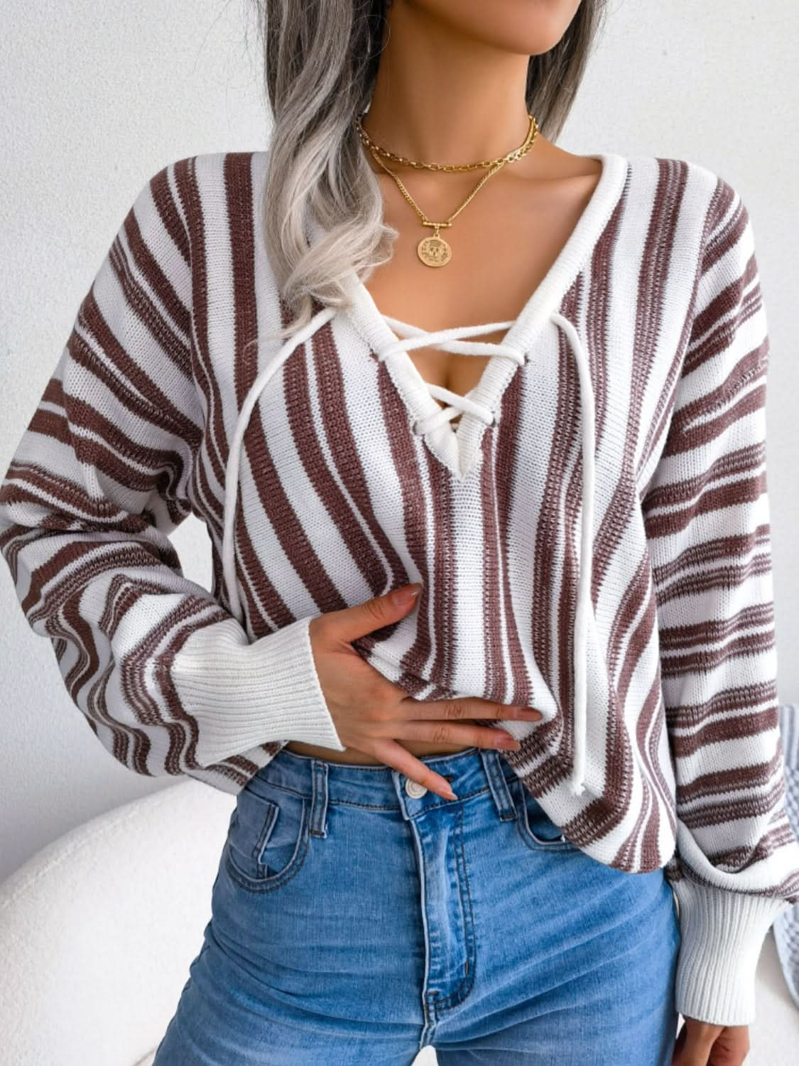 Lace-up striped long sleeve sweater