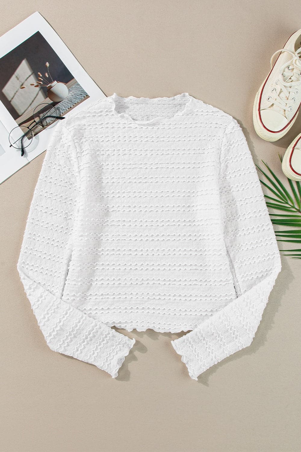 Textured Round Neck Long Sleeve Top.