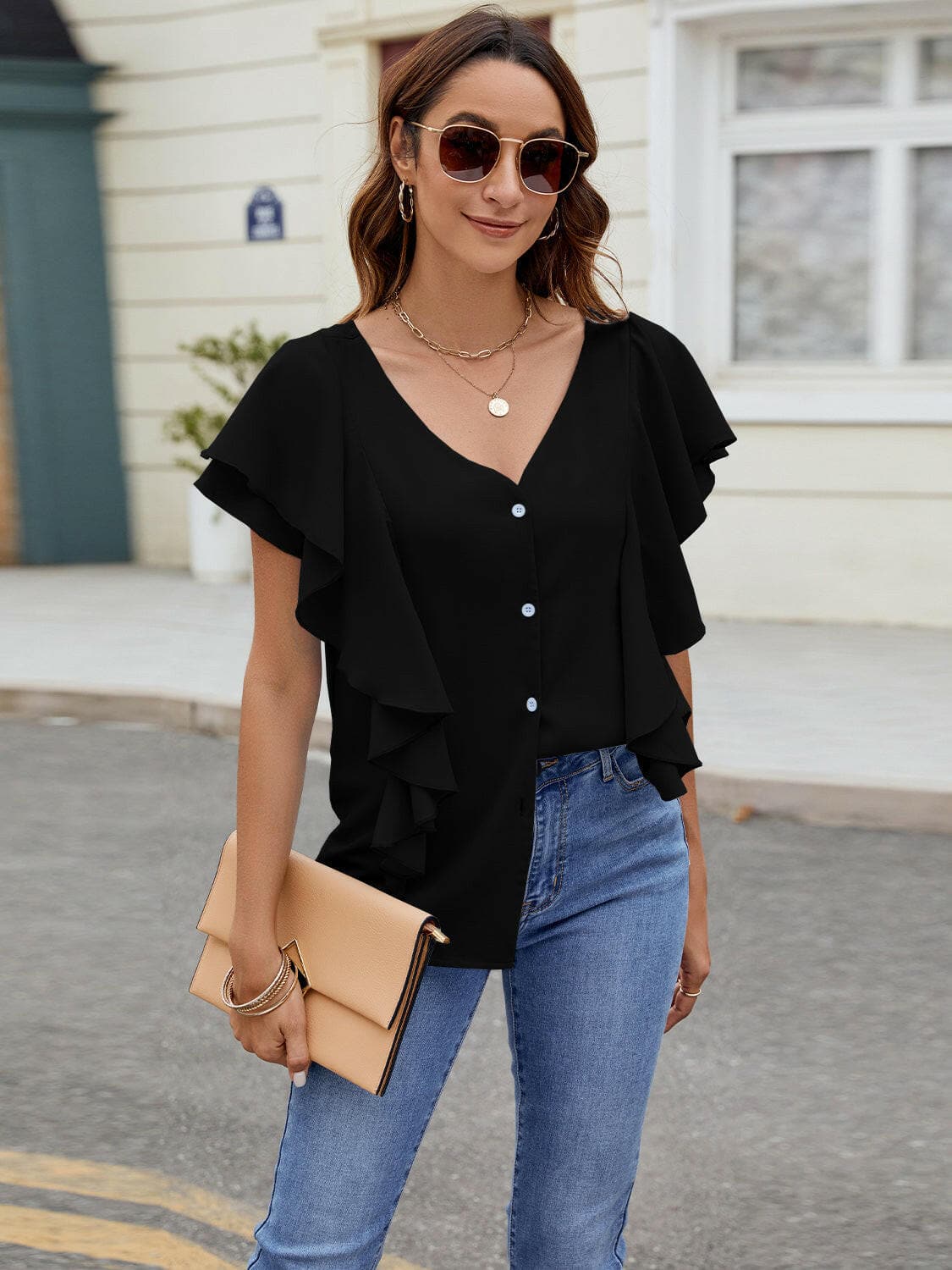 Ruffled V-Neck Short Sleeve TopRuffled V-Neck Short Sleeve Top

Introducing our elegant Ruffled V-Neck Short Sleeve Top, a must-have addition to your wardrobe for a touch of sophistication and styLove Salve -Neck Short Sleeve TopT-Shirts