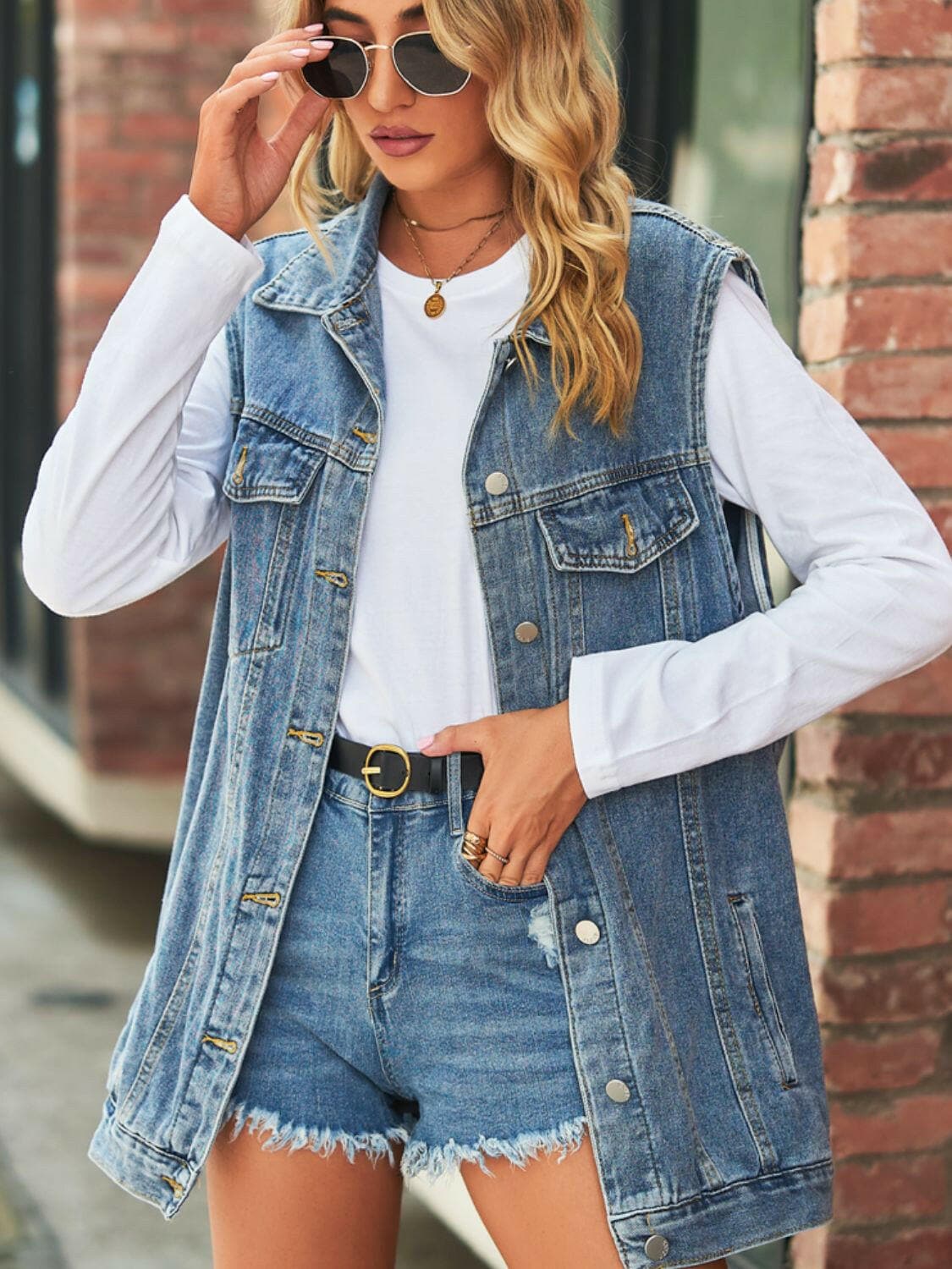 Collared Neck Sleeveless Denim Top with Pockets.