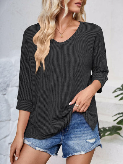 Textured Round Neck Three-Quarter Sleeve Blouse.