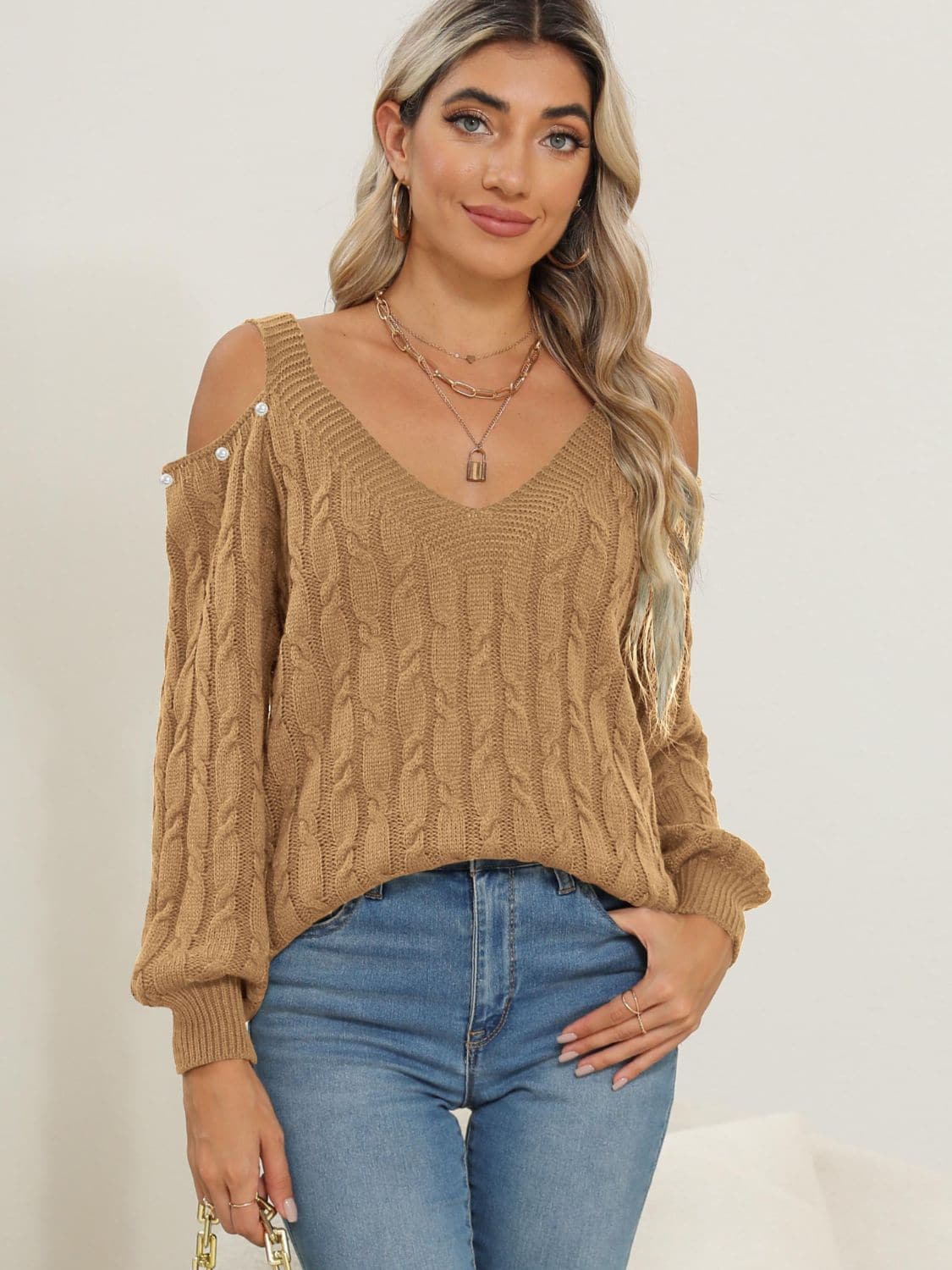 Chic cable-knit cold shoulder sweater