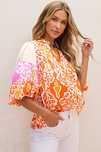 Printed Notched Half Sleeve Blouse.