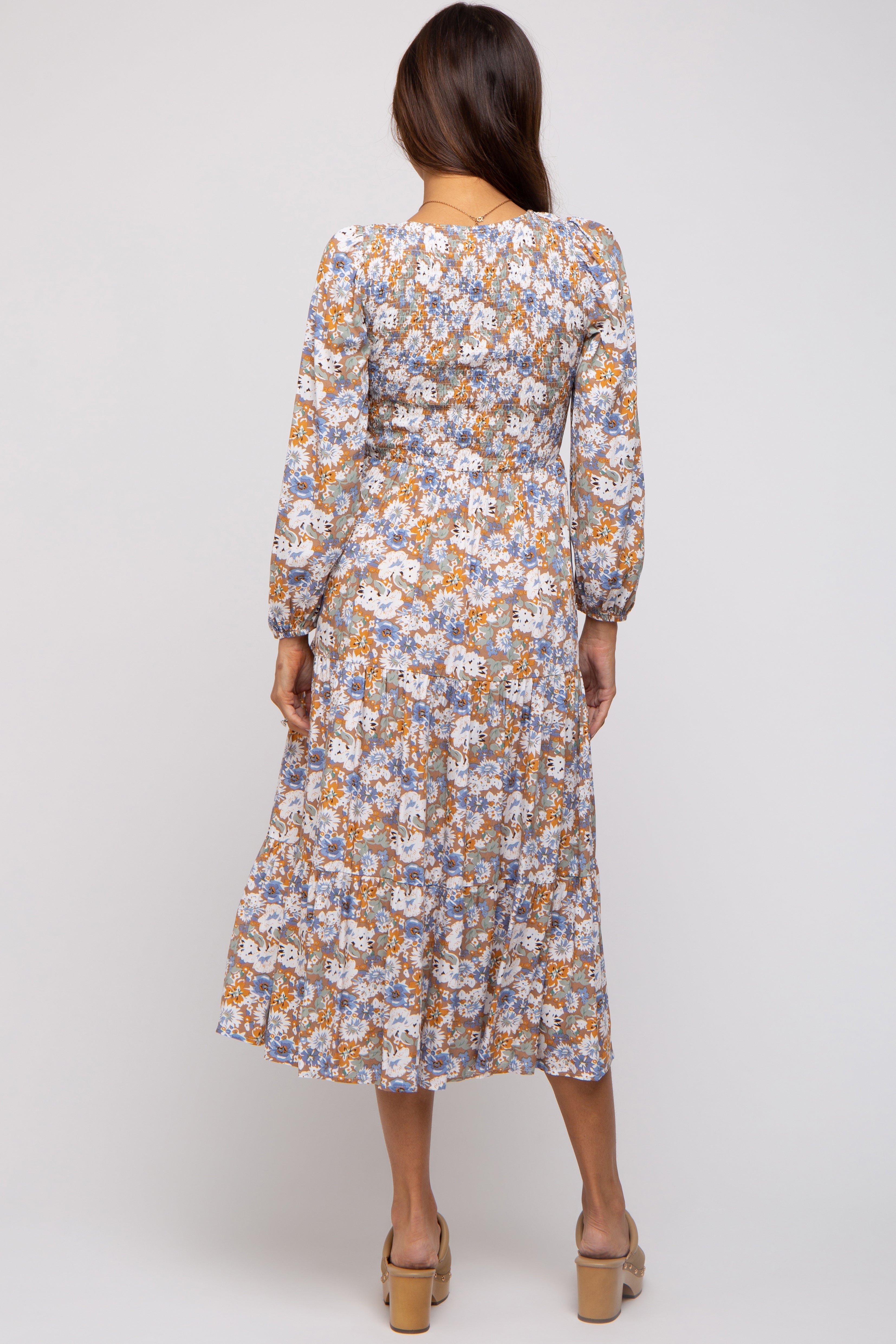 Taupe floral print maternity midi dress styled for pregnancy wear