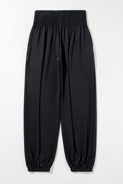 Chic black smocked joggers - high-rise comfort