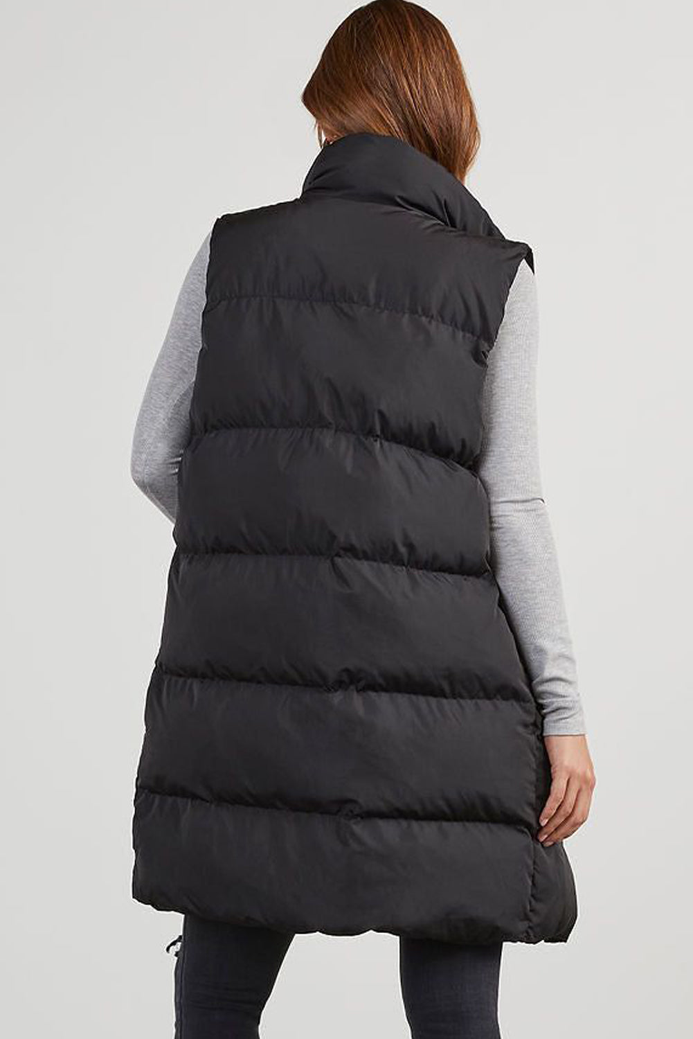 Stylish black longline windproof puffer vest with convenient pockets