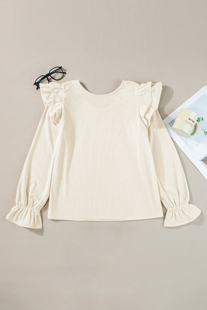 Chic beige corduroy blouse with ruffle sleeves