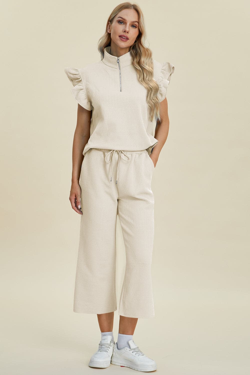 Double Take Full Size Texture Ruffle Short Sleeve Top and Wide Leg Pants Set.