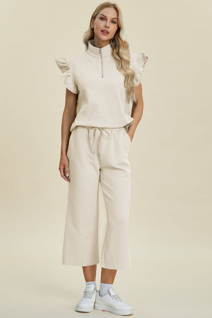 Double Take Full Size Texture Ruffle Short Sleeve Top and Wide Leg Pants Set.