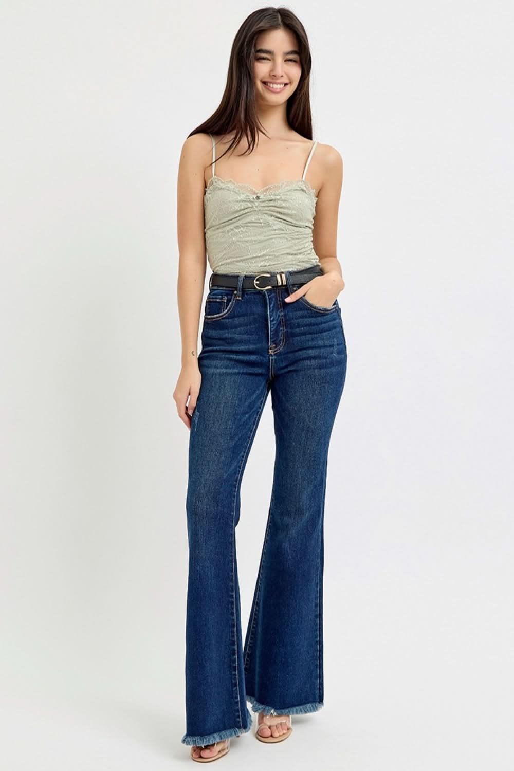 High-rise tummy control flare jeans with frayed hem and belt