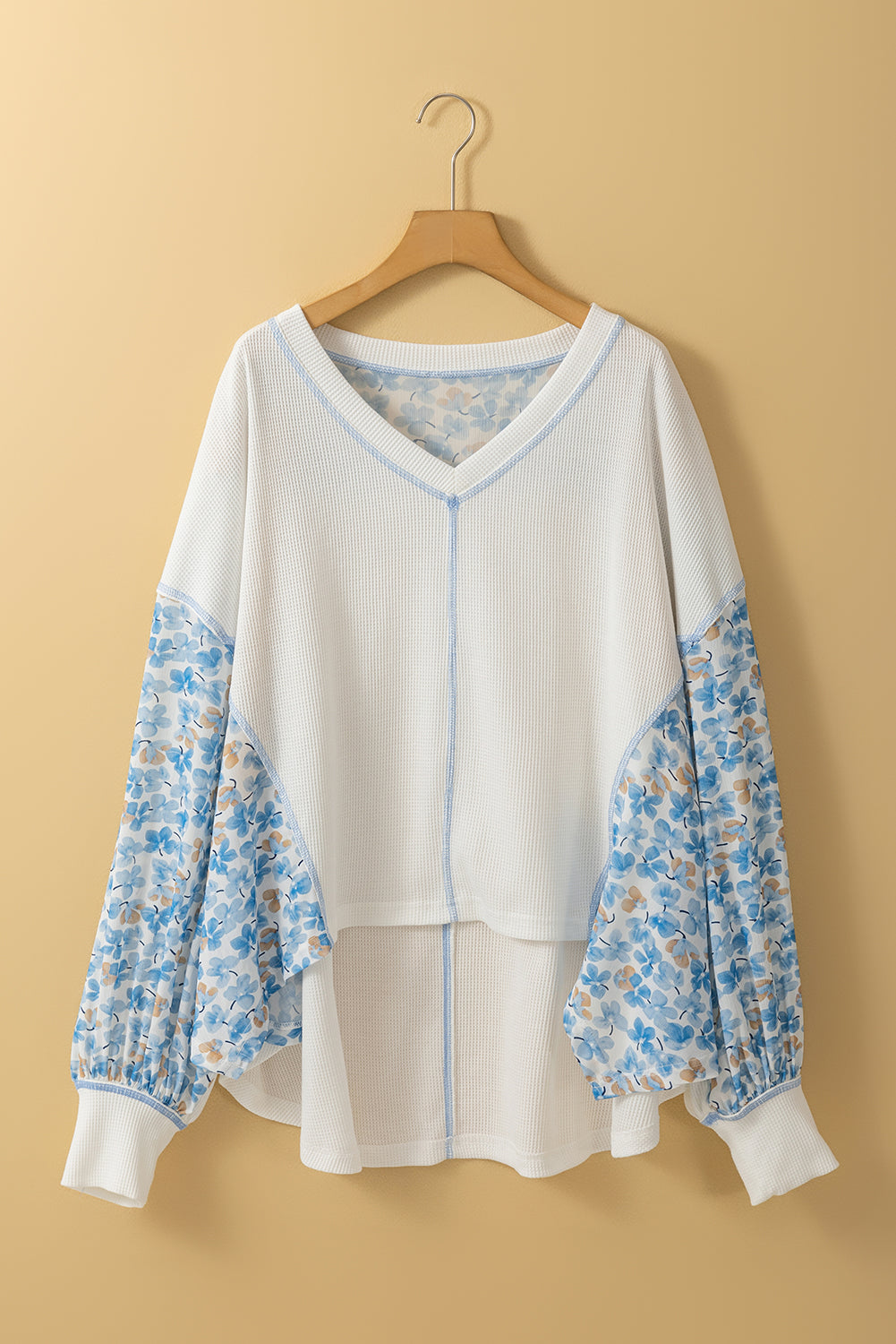 Chic white floral patchwork batwing blouse with V-neck design