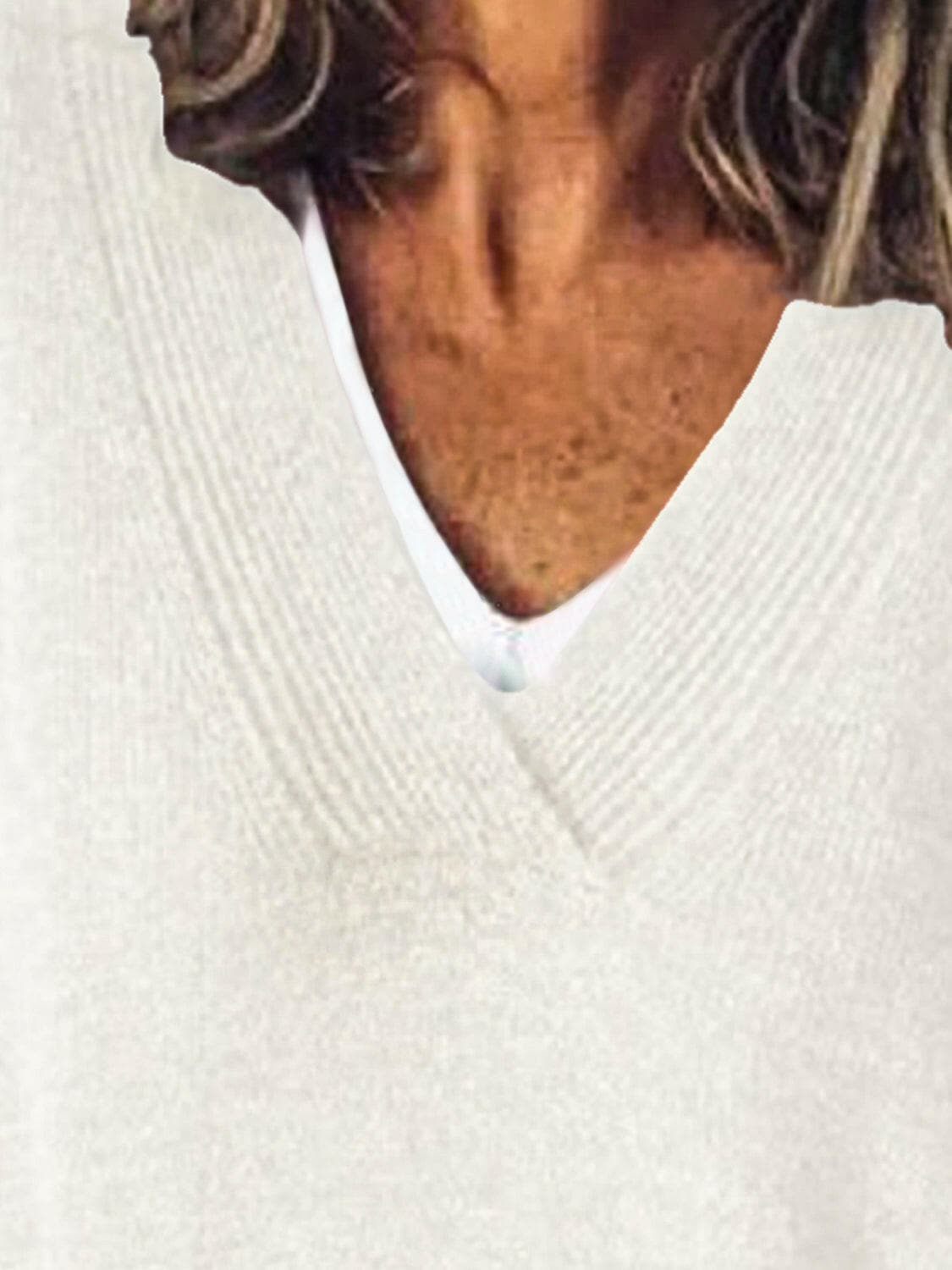 V-Neck Dropped Shoulder SweaterV-Neck Dropped Shoulder Sweater
 Upgrade your sweater collection with our V-Neck Dropped Shoulder Sweater, a perfect blend of style and comfort.
 Features:
 
 
BasicLove Salve -Neck Dropped Shoulder SweaterKnit Tops