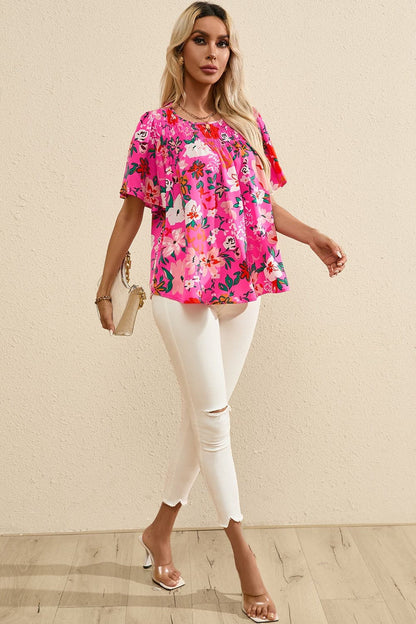 Smocked Printed Round Neck Half Sleeve Blouse.