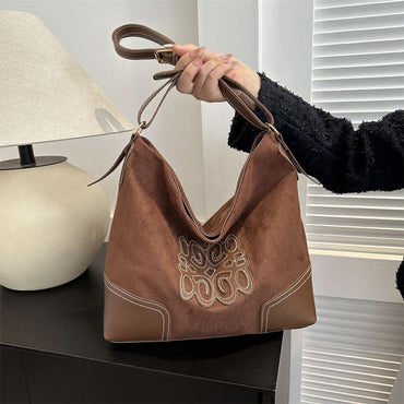 Chic suede tote with straps