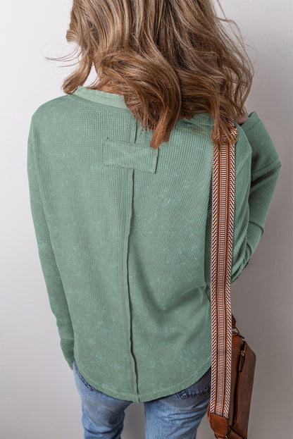 Trendy smoke green acid wash waffle knit long sleeve top with buttoned neckline