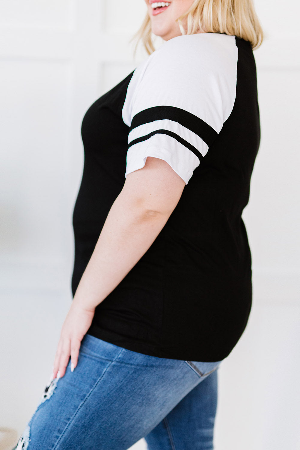 Chic black crisscross v-neck plus size tee with raglan sleeves