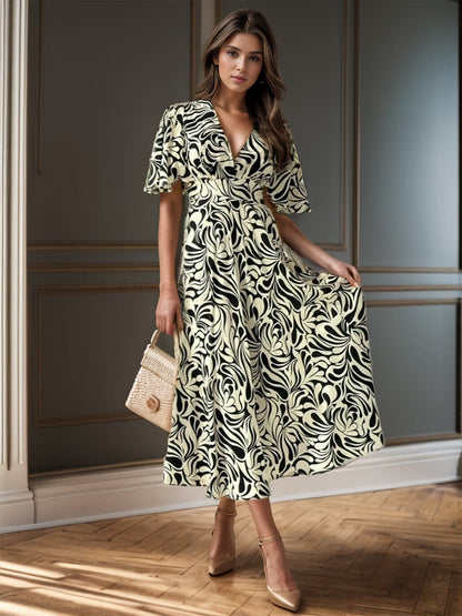 Printed Surplice Half Sleeve Midi Dress.