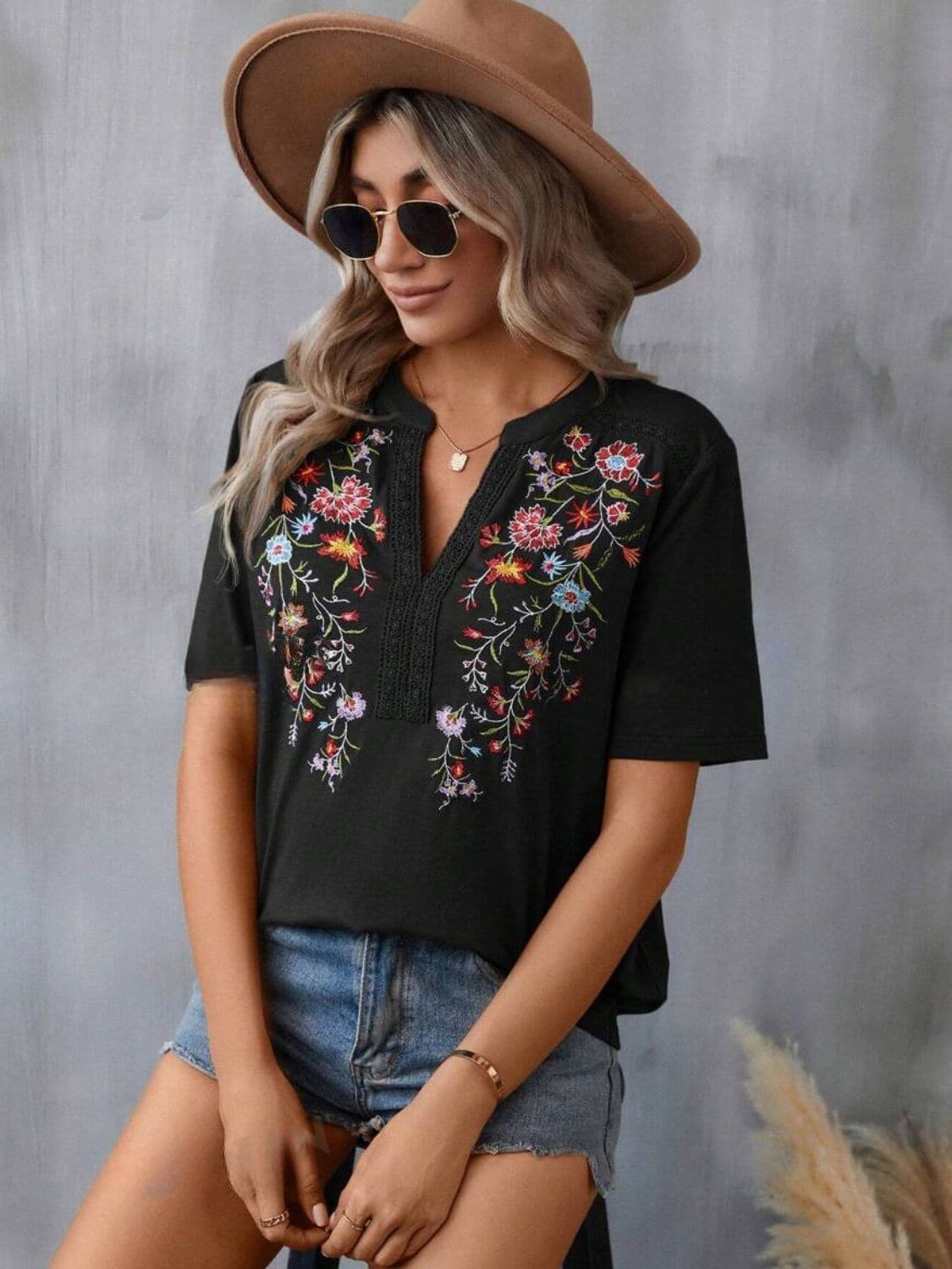 Embroidered Notched Short Sleeve T-Shirt.