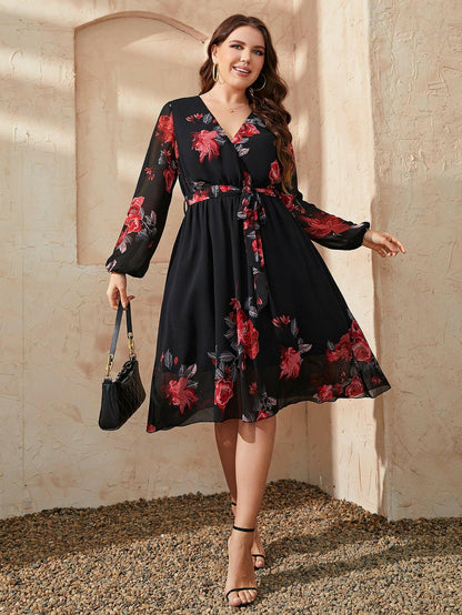 Plus Size Floral Surplice Neck Tie Waist DressUpgrade Your Wardrobe with Our Plus Size Floral Dress!
 
 
Style: Classy and Chic
 
Pattern Type: Floral
 
Neckline: Surplice
 
Length: Midi
 
Sleeve Length: Long BaLove Salve Size Floral Surplice Neck Tie Waist Dressplus