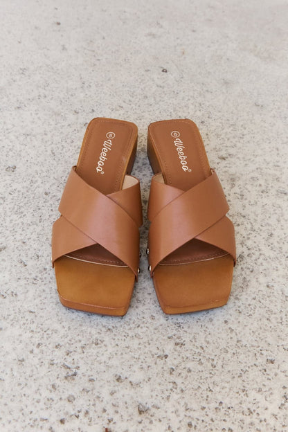 Weeboo Step Into Summer Criss Cross Wooden Clog Mule in Brown.