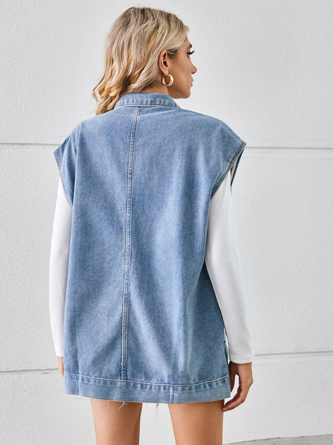 Pocketed Button Up Sleeveless Denim Jacket.