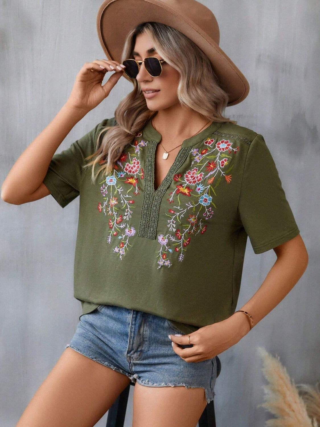 Embroidered Notched Short Sleeve T-Shirt.