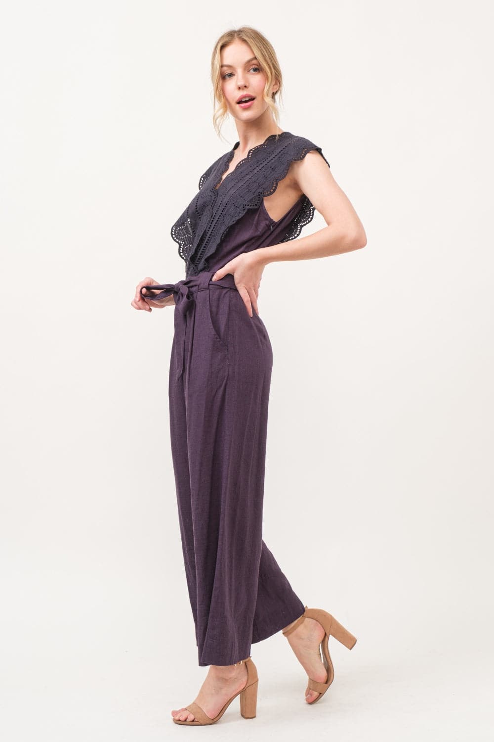 Elegant lace detail surplice jumpsuit with tie waist