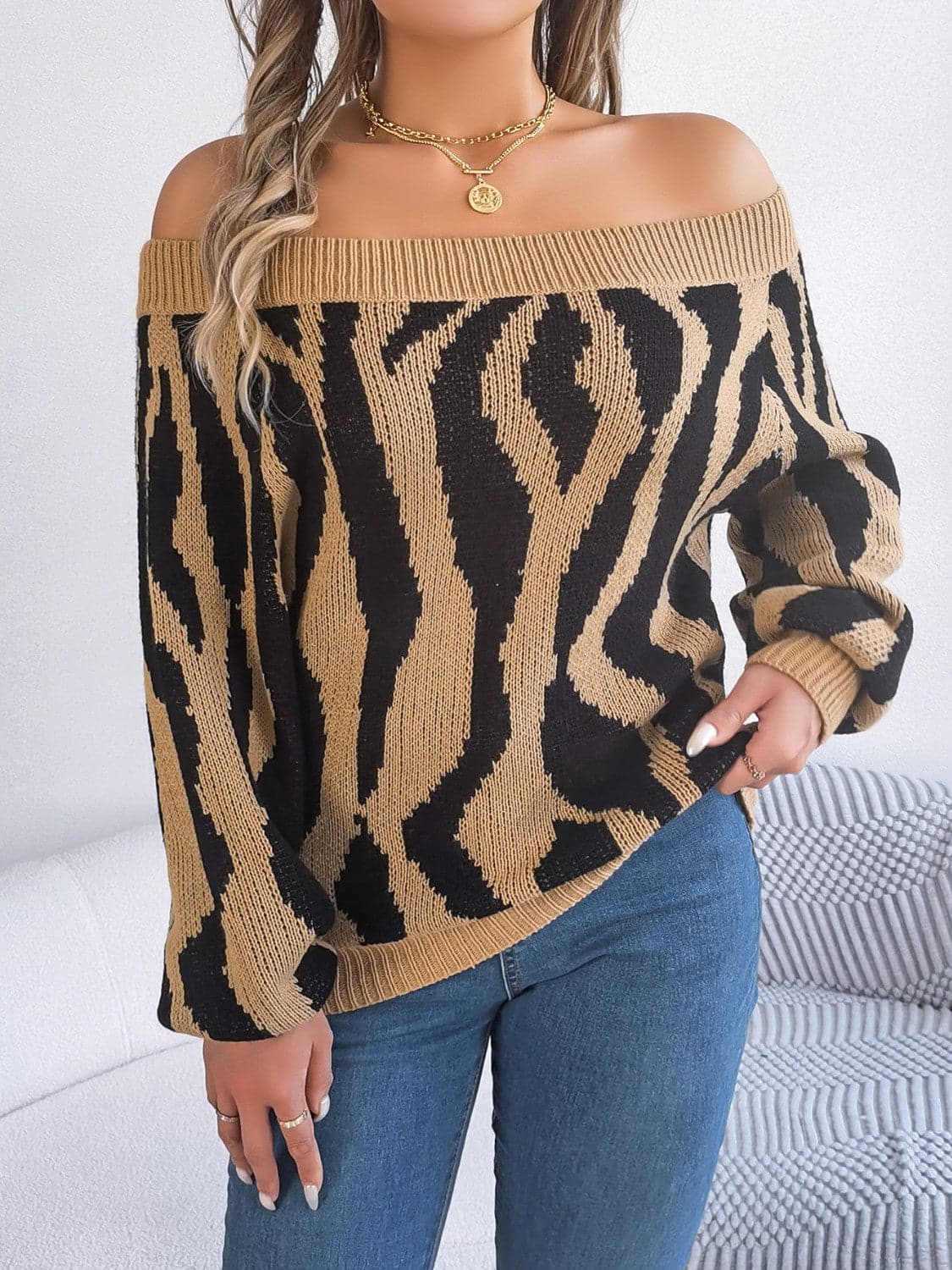 Off-Shoulder Animal Print Long Sleeve Sweater.