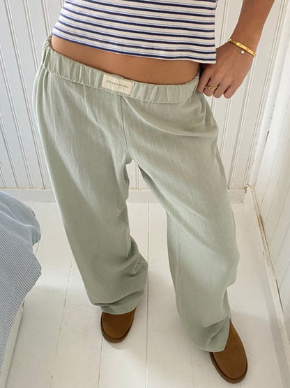 Chic sheer pocketed wide leg trousers with elastic waist