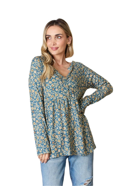 Heimish Full Size Floral Half Button Long Sleeve Blouse.