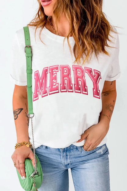 MERRY Round Neck Short Sleeve T-Shirt with pink lettering, worn by a woman with a green purse, casual style.