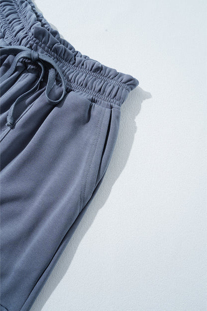 Trendy harem pants with lace-up waist