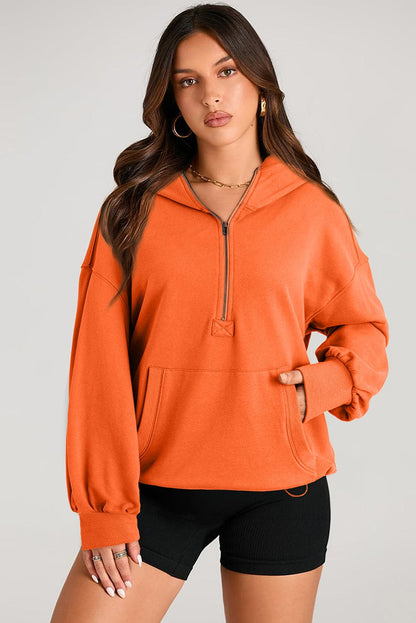 Sheer pocketed half zip hoodie for a stylish look