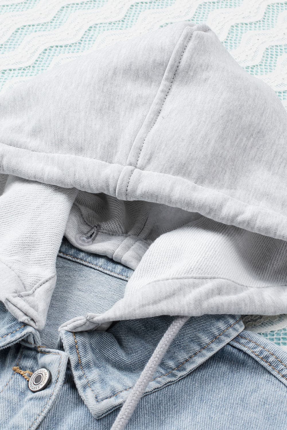 Distressed Hooded Denim Jacket.